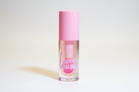 Blossom pH color-changing lip gloss shifting from clear to pink